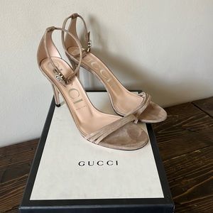Gucci heel with double G buckle embellishment at the ankle. Size 39.